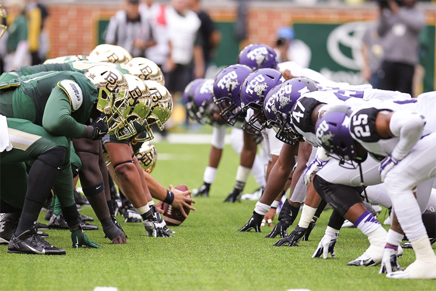 Baylor and TCU football players on the field
