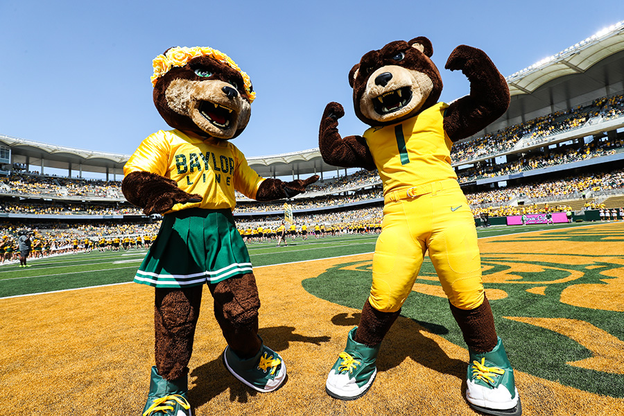 Marigold and Bruiser, Baylor mascots cheering on sidelines